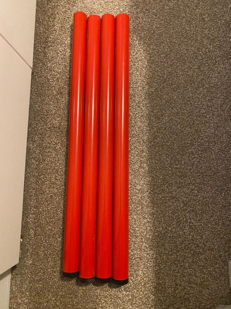 Four Red IKEA Table Legs for Collection in Abbey Wood