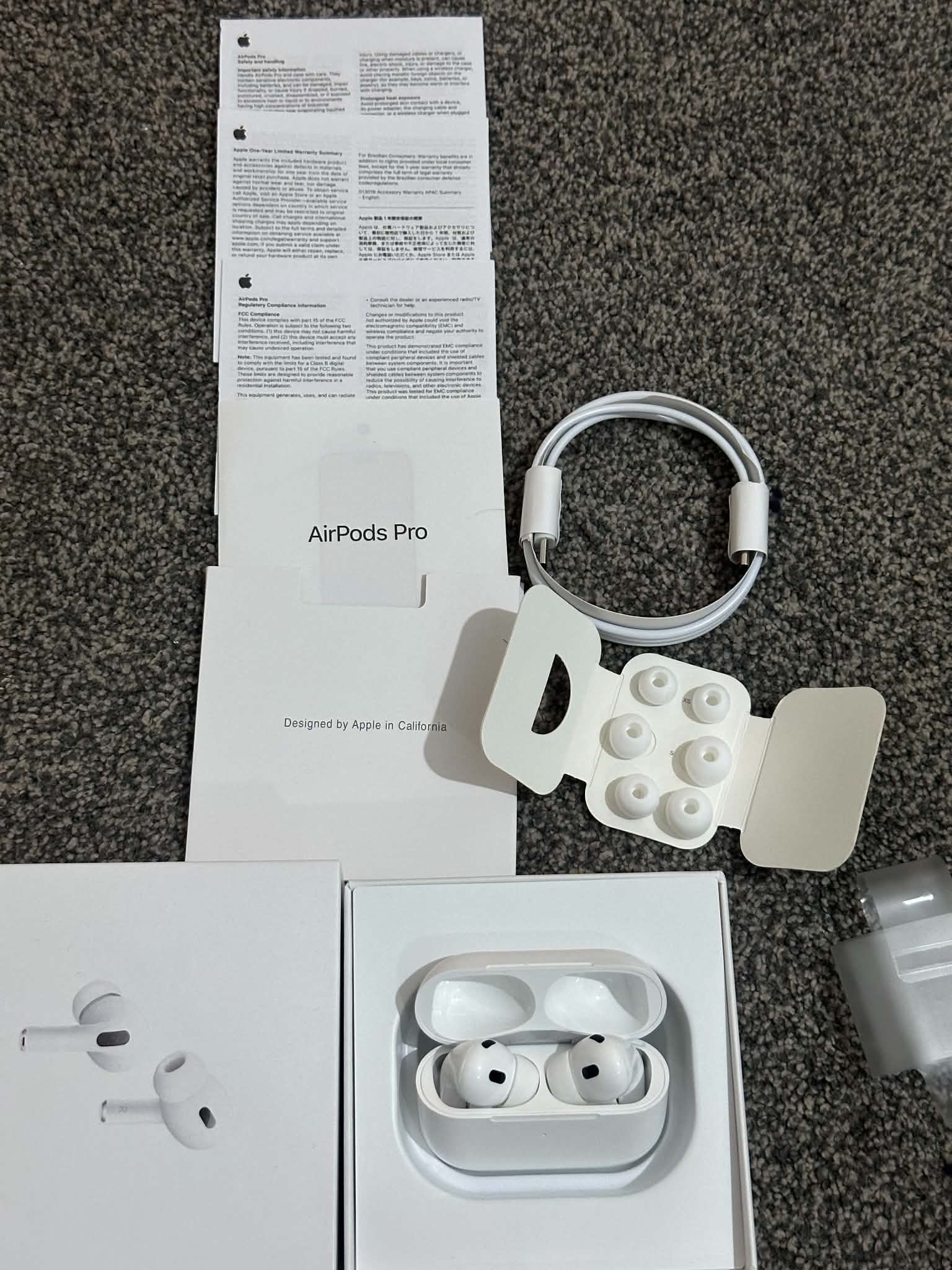AirPods Pro with case, cable, and documentation for sale