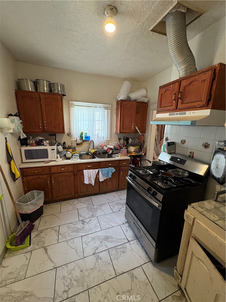 244 E 43rd Place, Los Angeles CA, 9001163768949173123122