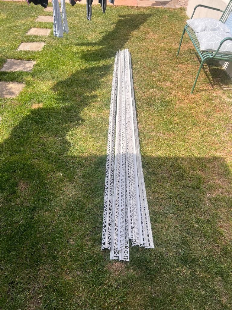 Nine White Plastic Plastering Beads for Sale