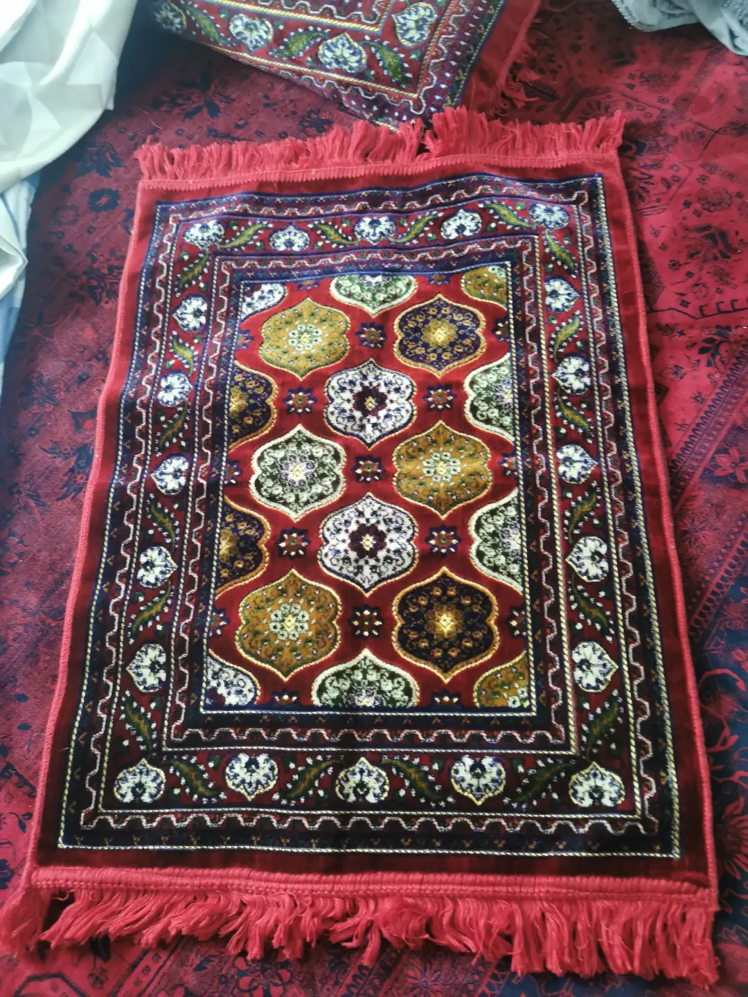 Red Geometric Rug with Gold Accents and Fringe