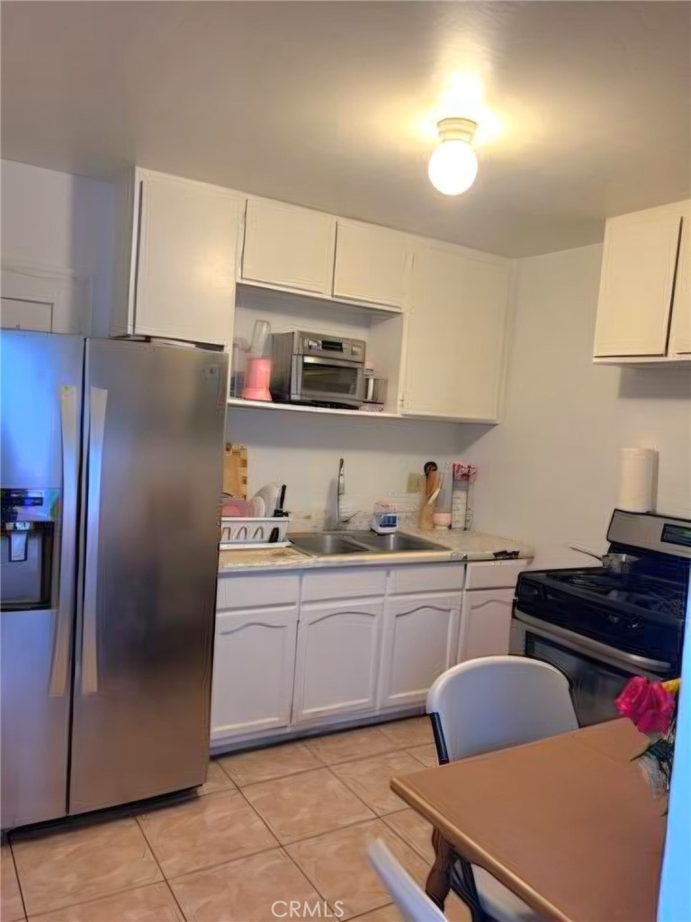 1715 E 70th, Los Angeles CA, 9000164065378024321122